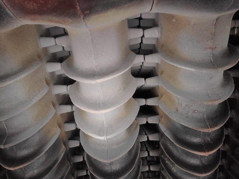 Performed scheduled maintenance on 14-year-old MVP steam boiler system between 12-4pm as requested by Jeff P. Inspection revealed significant frost buildup and visible cracks on heat exchanger fins. Cleaned affected components and documented condition of heat transfer surfaces showing signs of oxidation and wear consistent with system age.