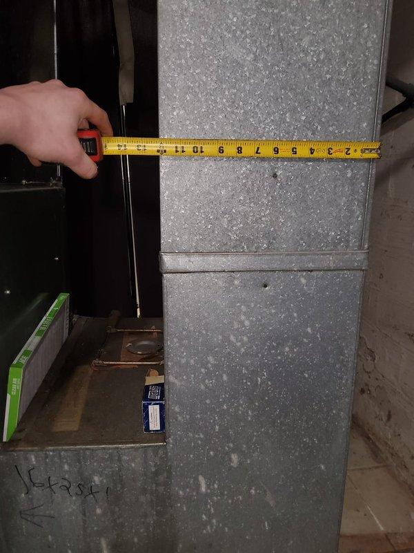 Performed diagnostic inspection on non-operational mini-split system in main floor den. Measured existing furnace return dimensions to determine appropriate filter size modifications needed. Identified that furnace filter outlet requires relocation to accommodate proper filter fitment, which was causing airflow issues.