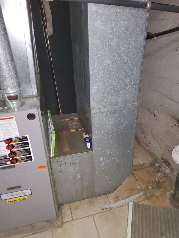 Performed diagnostic inspection on non-operational mini-split system in main floor den. Measured existing furnace return dimensions to determine appropriate filter size modifications needed. Identified that furnace filter outlet requires relocation to accommodate proper filter fitment, which was causing airflow issues.