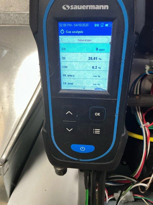 Performed scheduled maintenance on cooling system. Conducted gas analysis with Sauermann device which showed normal readings (CO: 0 ppm, O2: 20.61%, CO2: 0.2%). Inspected and cleaned blower wheel assembly which showed signs of dust accumulation.