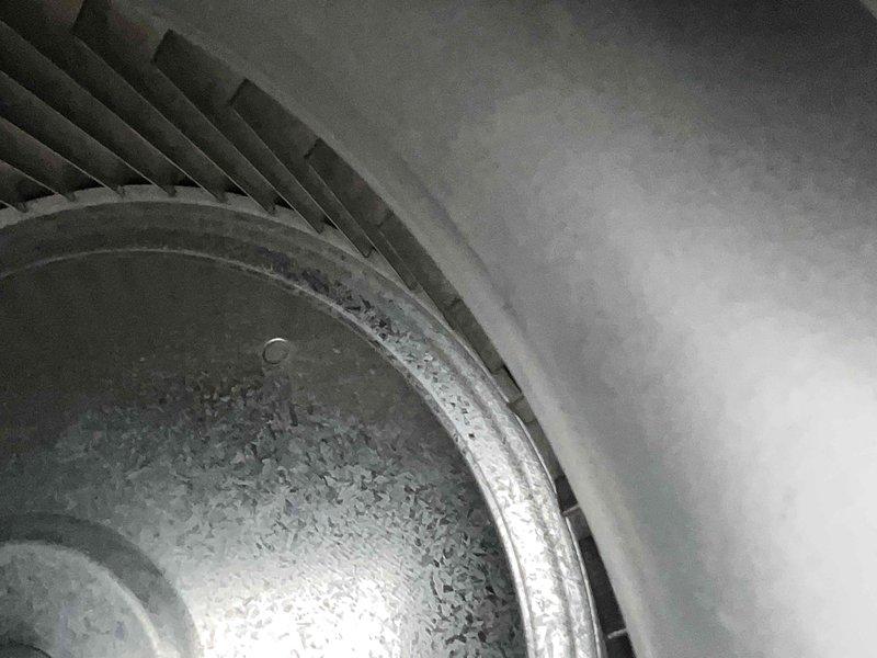 Performed scheduled maintenance on cooling system. Conducted gas analysis with Sauermann device which showed normal readings (CO: 0 ppm, O2: 20.61%, CO2: 0.2%). Inspected and cleaned blower wheel assembly which showed signs of dust accumulation.