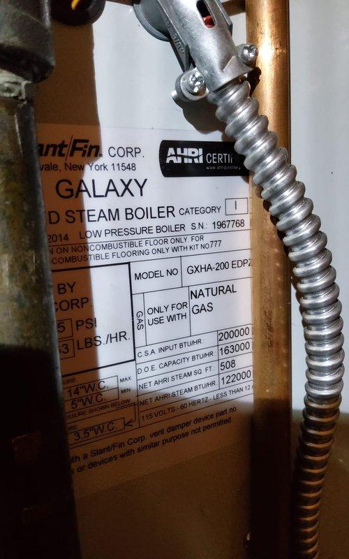 Performed annual heating tune-up on customer's Galaxy steam boiler (Model GXHA-200 EDP). Inspected natural gas burner assembly, confirmed proper flame pattern and combustion with all three burners operating efficiently. Examined gas valve assembly, connection points, and wiring for safety and functionality. System is operating within normal parameters at time of service.