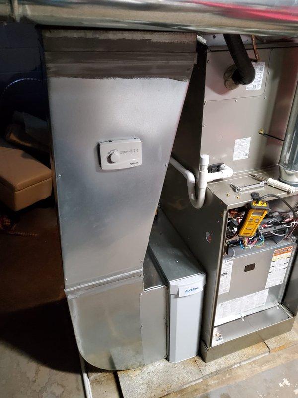 Completed installation of new 80% efficiency furnace, evaporator coil, condenser, humidifier, and air cleaner while replacing the existing lineset. Performed comprehensive system testing with digital multimeter to ensure proper electrical connections and operation. Existing thermostat and chimney liner were preserved and integrated with the new equipment for optimal system performance.