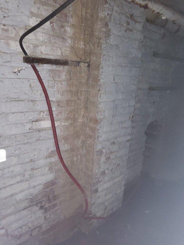 Completed installation of new steam gas boiler, replacing 5 leaking sections of the previous unit. Installed new brass valve assembly with proper connections to existing pipe system. Addressed significant water damage on ceiling from previous leaks and ensured proper drainage through new red condensate line secured to the brick wall.