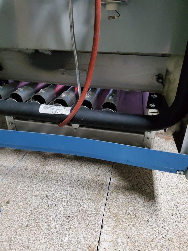 Performed maintenance service on 4-year-old steam boiler exhibiting surging issues. Observed frost accumulation on heat exchanger fins and signs of corrosion. Skimmed boiler to address water quality concerns and inspected burner assembly for proper operation. Customer renewed maintenance value plan.