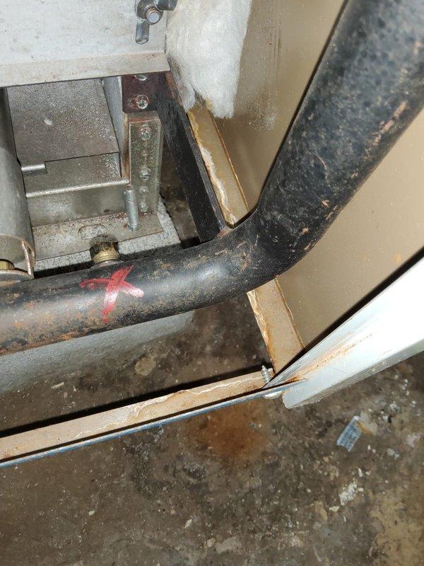 Completed installation of vents, water feeder, and low water cut-off on heating system. Properly connected copper piping with appropriate valves and verified water level control functionality. System now operating with proper safety controls in place.