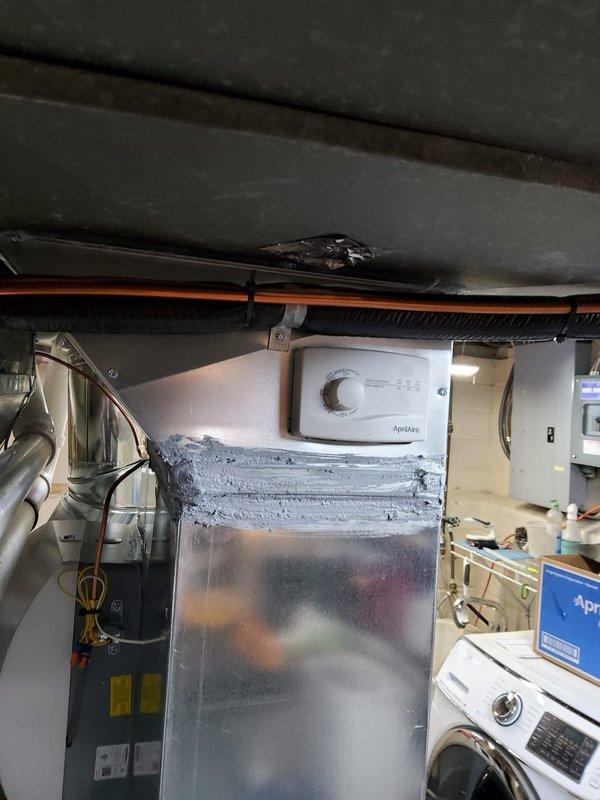 Completed installation of complete HVAC system including new furnace, evaporator coil, condenser, air cleaner, AprilAire humidifier and thermostat. Installed proper venting out the left side with new refrigerant lines. System includes Bradford White water heater with all connections properly secured and tested for optimal performance.