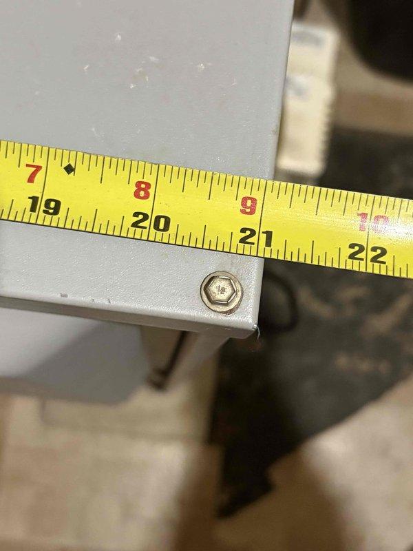 Conducted on-site evaluation for furnace replacement estimate. Took detailed measurements of the existing unit and surrounding installation area, with dimensional readings ranging from 7-36 inches to ensure proper sizing for replacement equipment. Documented current equipment configuration including mounting hardware for accurate replacement specifications.