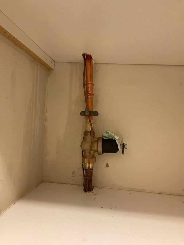 Conducted plumbing assessment of existing copper supply lines with multiple shutoff valves in wall cavity and built-in cabinet structure. Inspected soldered joints, valve functionality, and overall system integrity as requested in service notes from Paul.