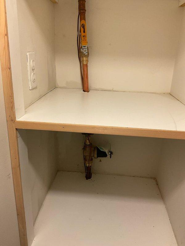 Conducted plumbing assessment of existing copper supply lines with multiple shutoff valves in wall cavity and built-in cabinet structure. Inspected soldered joints, valve functionality, and overall system integrity as requested in service notes from Paul.