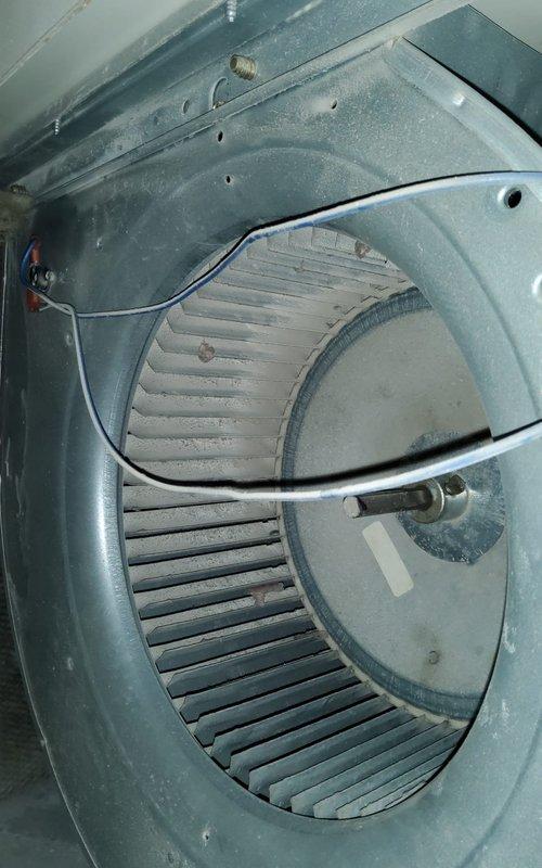 Responded to service call for non-functioning furnace with heating failure. Inspection revealed severe dirt and debris accumulation in the heat exchanger with visible damage and white mineral deposits. Blower wheel assembly showed significant dust buildup affecting proper airflow. Performed thorough cleaning of components to restore proper operation.