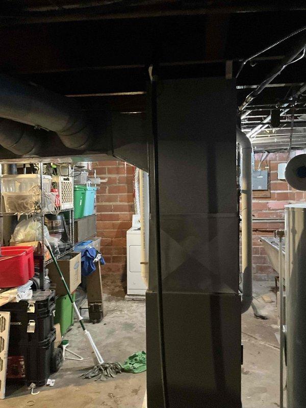 Performed furnace replacement estimate for customer experiencing no heat issue. Current unit located in basement with brick walls shows significant age. Replacement part is on back-order, with installation scheduled for January 28th. Comprehensive assessment completed with photo documentation of existing system and installation environment.