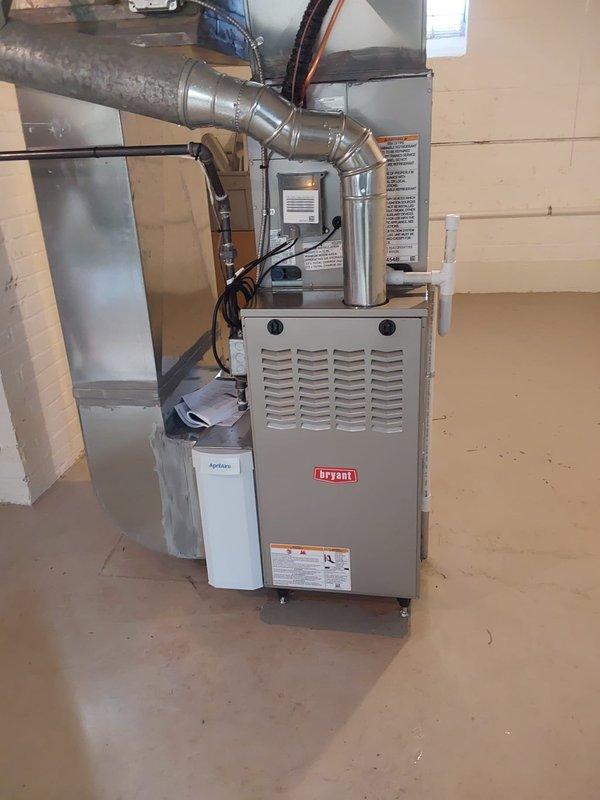 Completed full HVAC system replacement including new Bryant furnace, Bryant AC unit, and water heater with financing. Installation included replacement of return drop and lineset, addition of chimney liner, and installation of Aprilaire filter while preserving existing thermostat functionality.