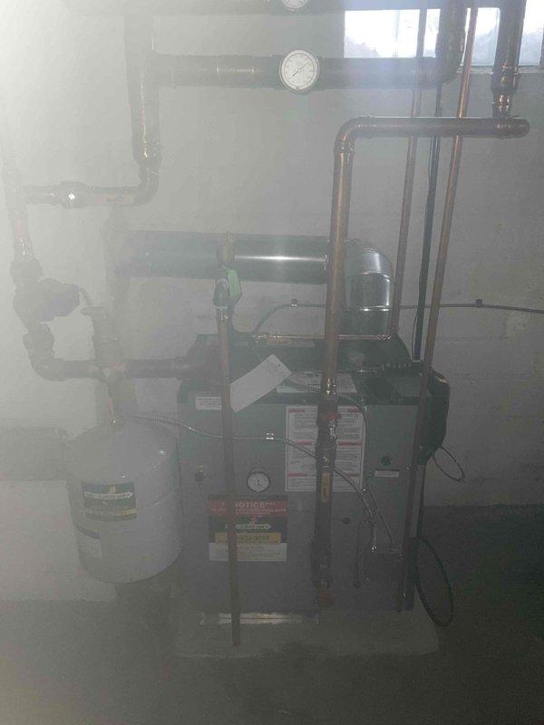 Performed scheduled boiler maintenance service that had been previously rescheduled. Inspected system components including copper piping network, pressure gauge, and expansion tank. All equipment was found in normal working condition with no visible issues or anomalies requiring repair.