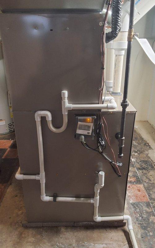 Completed installation of complete HVAC system including new furnace and AC unit with proper flue pipe rework. Installed new filter cabinet and humidifier while connecting to existing thermostat. Replaced lineset and verified proper system operation with all connections secure and system functioning according to manufacturer specifications.