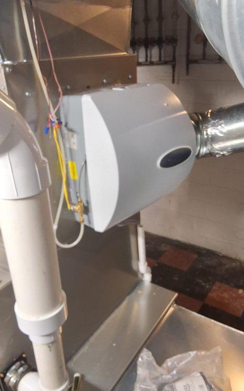 Completed installation of complete HVAC system including new furnace and AC unit with proper flue pipe rework. Installed new filter cabinet and humidifier while connecting to existing thermostat. Replaced lineset and verified proper system operation with all connections secure and system functioning according to manufacturer specifications.