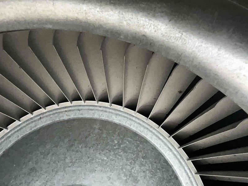 Performed scheduled heating tune-up on residential furnace system. Inspected blower assembly and motor for proper operation, finding normal wear. Examined gas valve and burner assembly connections, noting minor oxidation on copper fitting but confirming proper functionality. System is operating within specifications after service.