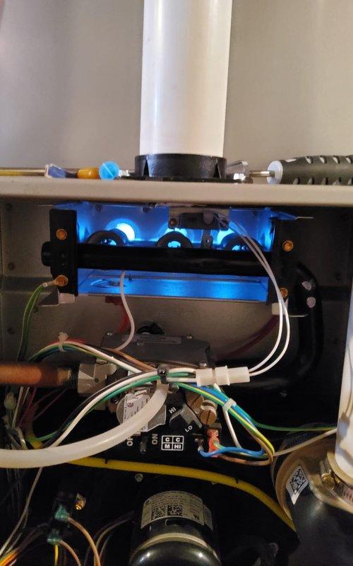 Performed scheduled furnace tune-up service, including combustion analysis using UEi C161 analyzer. Testing confirmed proper operation with combustion readings of 11.0% O2, 16ppm CO, and 5.6% CO2 at 77.8°F. Visual inspection of burner assembly showed clean blue flames indicating efficient combustion. Replaced customer's air filter with the requested Aprilaire 410 filter.