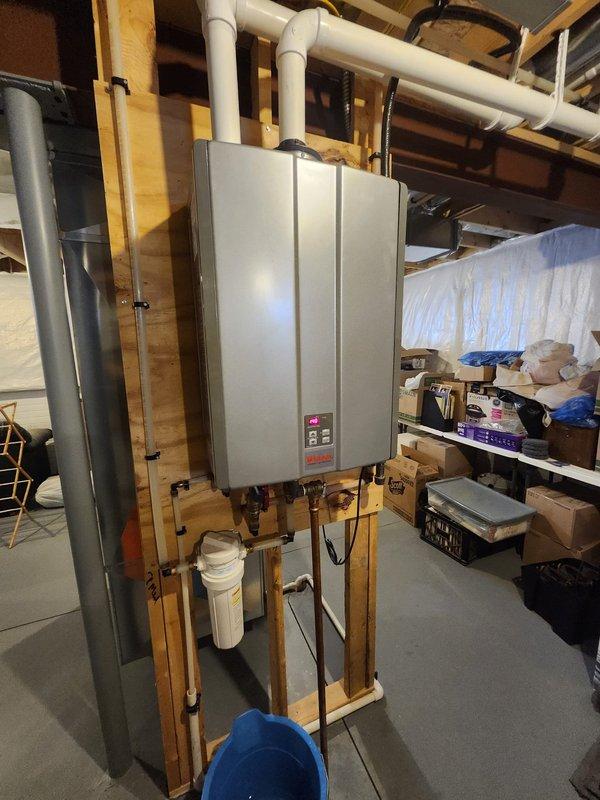 Successfully replaced the pressure relief valve connection on customer's tankless water heater. Work included disconnecting the existing faulty valve, installing new components, and verifying proper system operation upon completion. All connections were tested to ensure no leaks and proper pressure regulation.