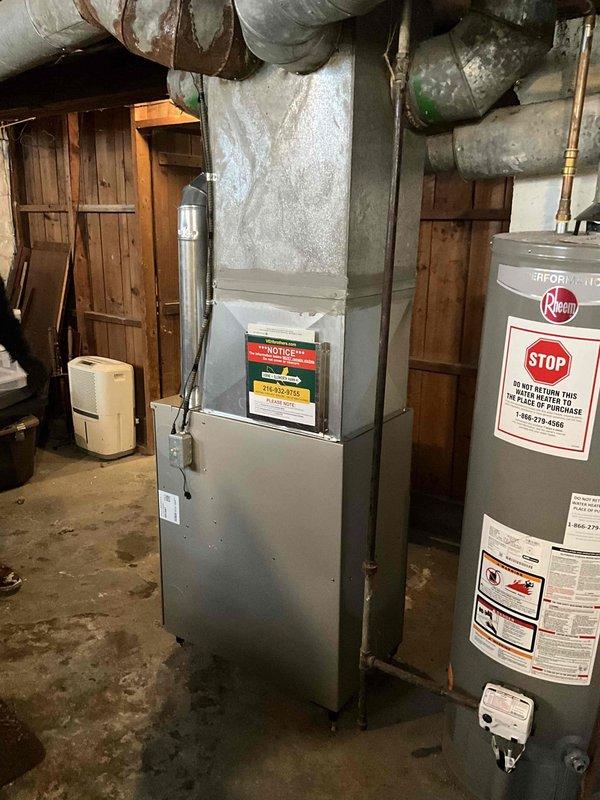 Successfully removed and replaced 80% efficiency furnace in basement utility area, connecting to existing gas line and electrical. Properly installed with appropriate exhaust venting, and all manufacturer safety labels verified intact.