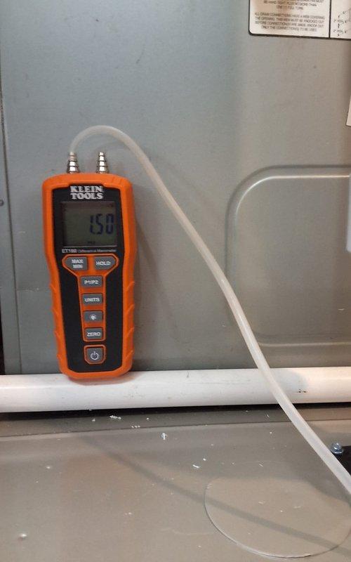 Installed new furnace and thermostat while reusing existing AC system, humidifier, filter, and condensate pump. Maintained compatibility with existing 21" wide furnace space and reused 3" PVC venting. Performed gas pressure testing with manometer, confirming proper readings at 350 WC and 15.0 WC to ensure system operates within manufacturer specifications.