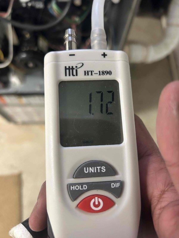 Performed scheduled maintenance on 12-year-old MVP gas furnace. Conducted combustion analysis with readings of CO2 6.5%, O2 9.6%, and efficiency rating of 92.4%. Temperature measurements showed 112.1°F at primary sensor. Additional pressure differential testing completed with HT-1890 meter showing 1.72 reading. System operating within manufacturer specifications.