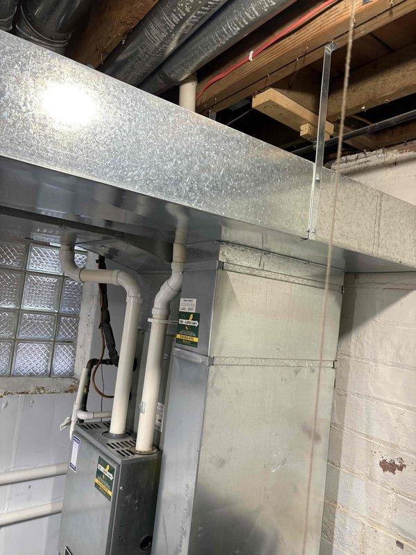 Diagnosed no heat issue in 10-year-old system. Replaced faulty inducer capacitor and performed maintenance by cleaning condensate drain line, restoring proper heating function. Recommended full system replacement due to unit age and potential for future failures.