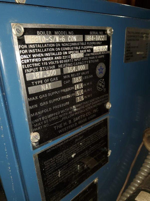 Performed annual inspection on a Burnham G210-S/N-6 CON boiler (S/N: H84-1022) with 175,000 BTU/HR heating capacity. Inspected heat exchanger tubes and burner assembly, noting normal wear consistent with equipment age. System is functioning properly with no safety concerns identified.