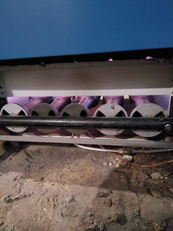Performed annual inspection on a Burnham G210-S/N-6 CON boiler (S/N: H84-1022) with 175,000 BTU/HR heating capacity. Inspected heat exchanger tubes and burner assembly, noting normal wear consistent with equipment age. System is functioning properly with no safety concerns identified.