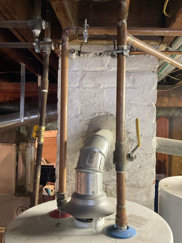 Performed scheduled maintenance flush on three tanked water heaters (including one Hotpoint model) to remove sediment buildup and maintain optimal system efficiency. Inspected all units, connections, and venting systems for proper operation. All water heaters now functioning correctly with improved performance and extended service life.
