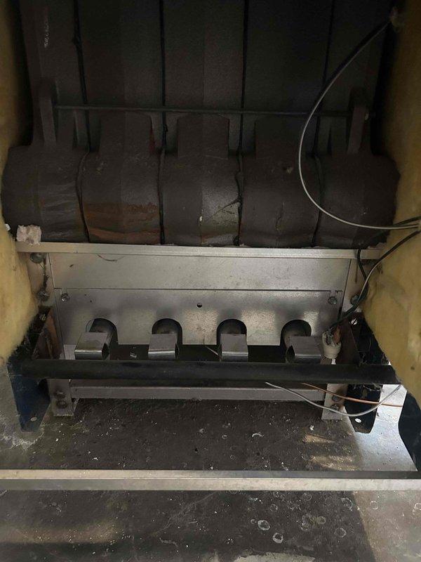 Responded to service call for 10-year-old residential boiler with automatic shutoff malfunction. Diagnosed and repaired site gauge issue affecting water level monitoring system. Inspected heat exchanger tubes and burner assembly, noting normal wear consistent with unit age.