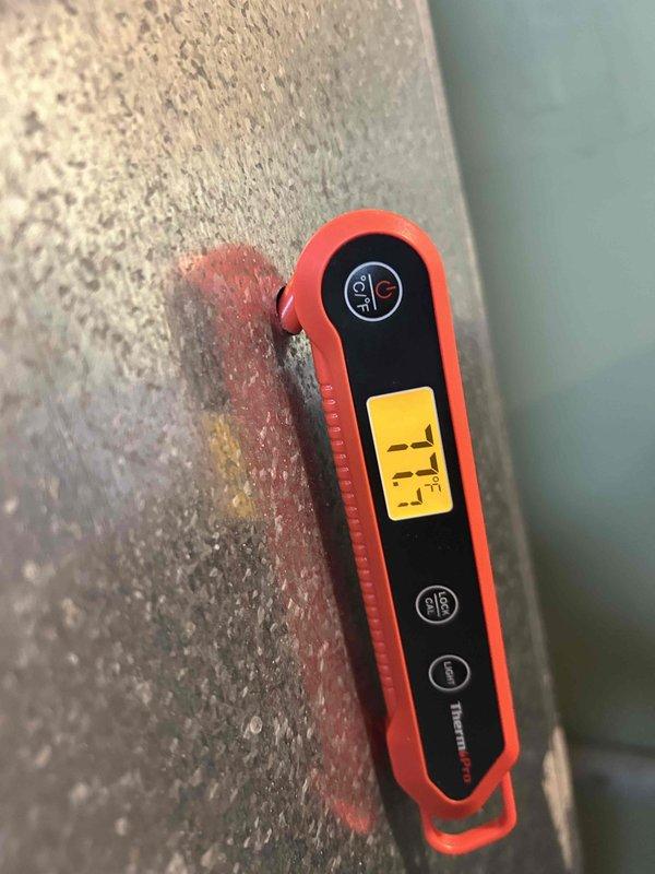 Performed comprehensive heating system diagnostic on customer's boiler and furnace. Conducted temperature measurements (77.7°F) and electrical testing with multimeter showing 1.45A current draw during operation. System functioning within normal parameters after maintenance service.