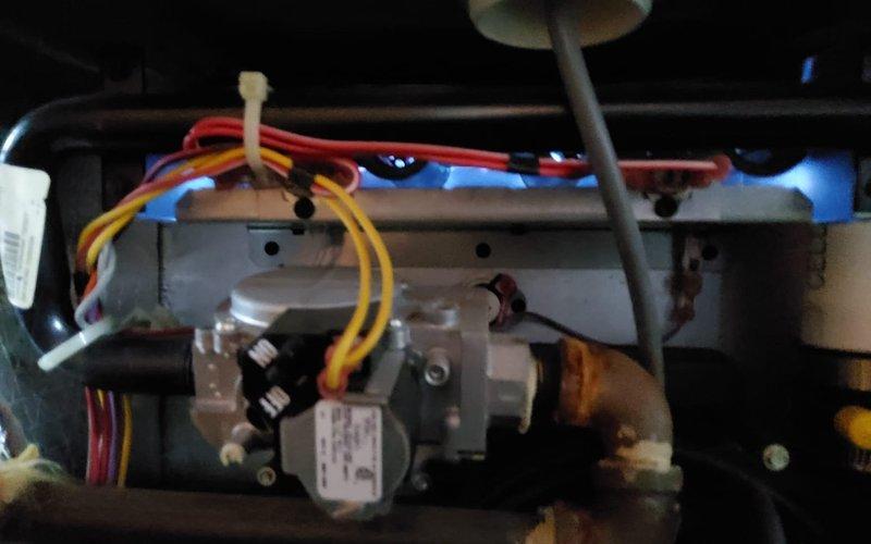 Responded to no heat call for existing customer with York furnace. Diagnosed faulty gas valve causing heat failure. Replaced gas valve assembly, reconnected electrical connections and copper gas line, then verified proper system operation and heat production.