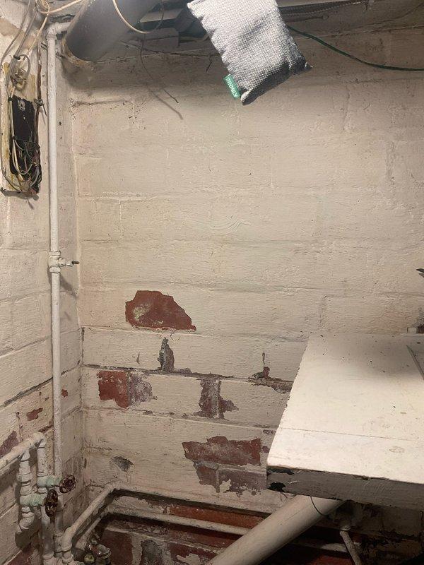 Performed scheduled maintenance service on customer's tankless water heater system. Inspected all plumbing connections, ventilation ducts, and electrical components. Noted some deterioration of wall surfaces around installation area but confirmed all systems functioning properly with no immediate concerns.
