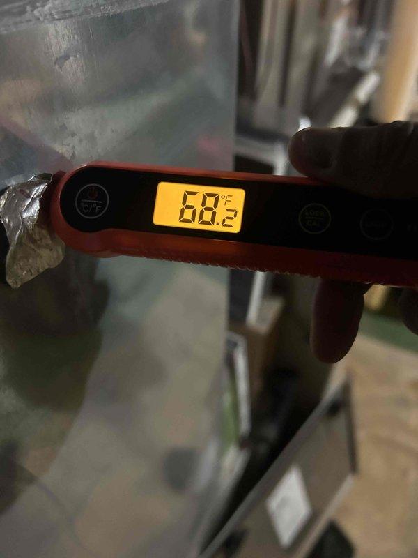 Performed furnace tune-up and preventative maintenance service. Conducted electrical diagnostics with multimeter showing 35.47V reading and verified heat exchanger temperature at 68.2°C, confirming system is operating within normal parameters.