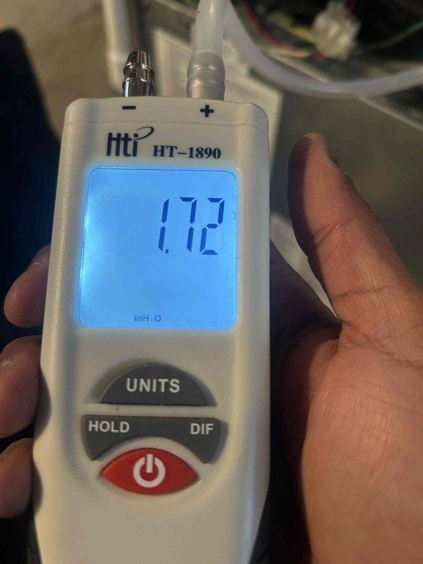 Performed scheduled heating tune-up on system. Conducted gas pressure testing with manometer showing readings of 1.72 inH₂O and 15.2, confirming proper operational parameters. All measurements within manufacturer specifications.
