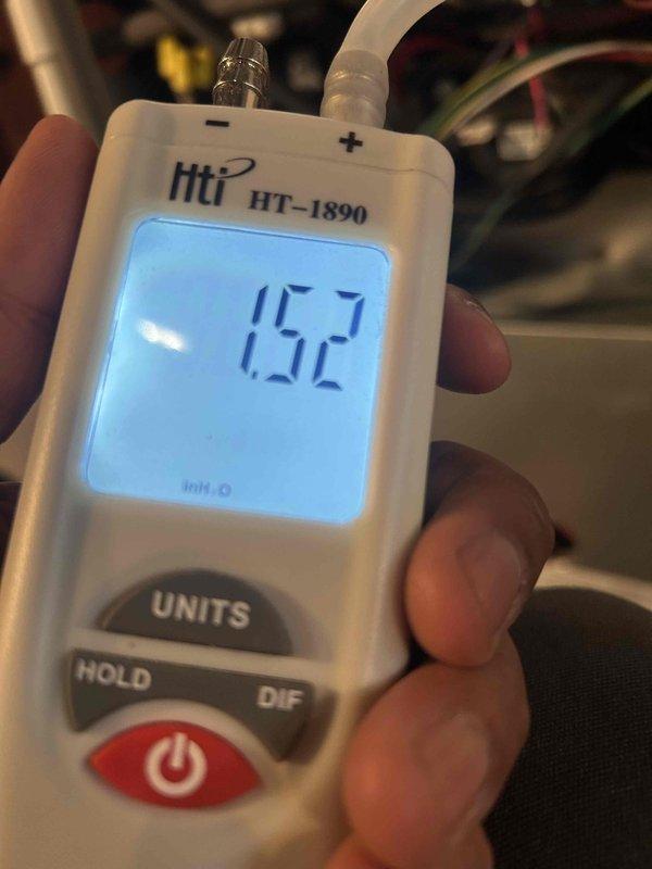 Performed scheduled heating tune-up on system. Conducted gas pressure testing with manometer showing readings of 1.72 inH₂O and 15.2, confirming proper operational parameters. All measurements within manufacturer specifications.