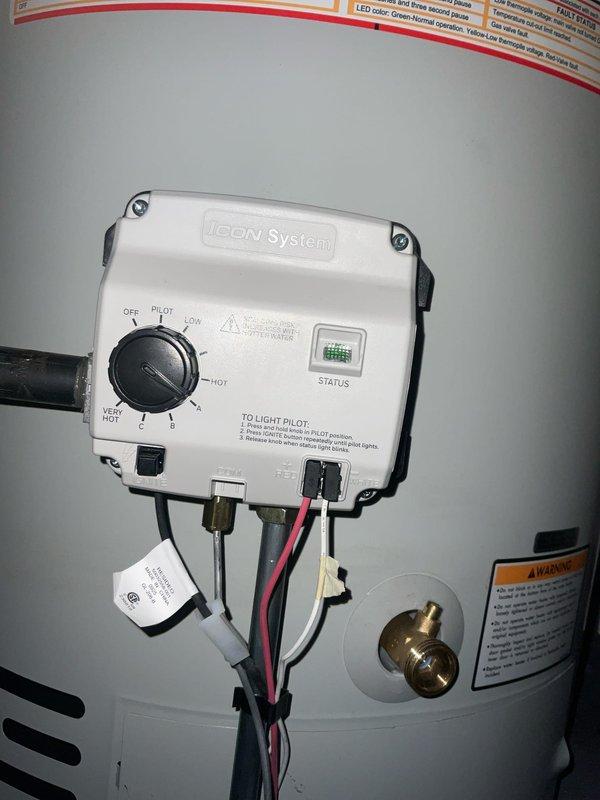 Installed new water heater with proper bonding of water lines to meet code requirements. Completed installation includes expansion tank and ICON System control unit. All connections verified and system functioning correctly.