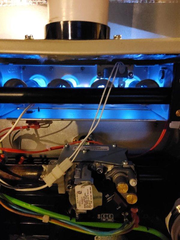 Responded to no-heat call for recently installed furnace. Inspected unit and found burners operating properly with normal blue flame pattern. Verified all electrical connections were secure and gas valve functioning correctly. System now heating effectively.
