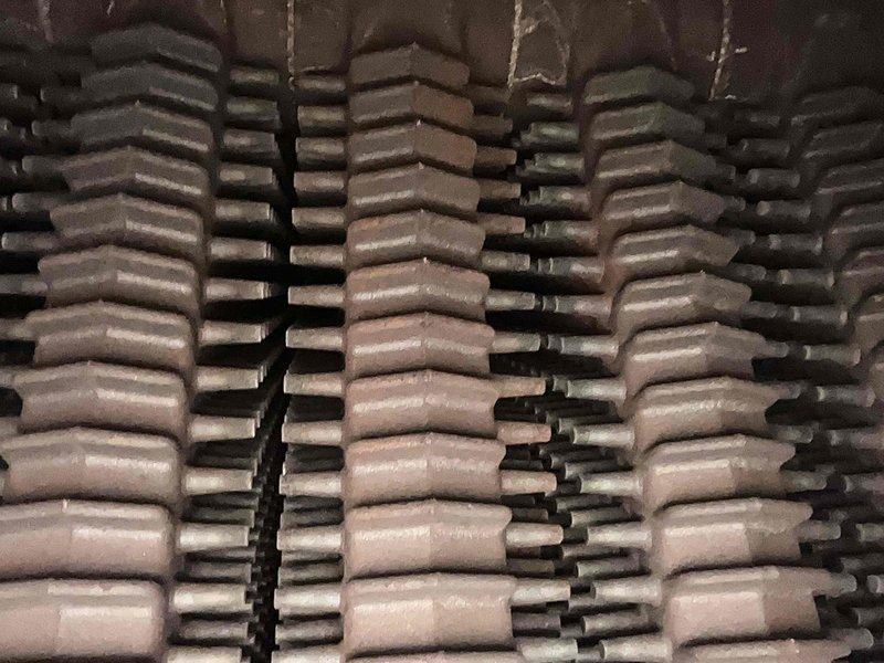 Performed scheduled boiler tune-up service. Inspected heat exchanger fins and burner assembly, confirming proper flame pattern with characteristic blue color indicating efficient combustion. All components were found to be in functional working condition.