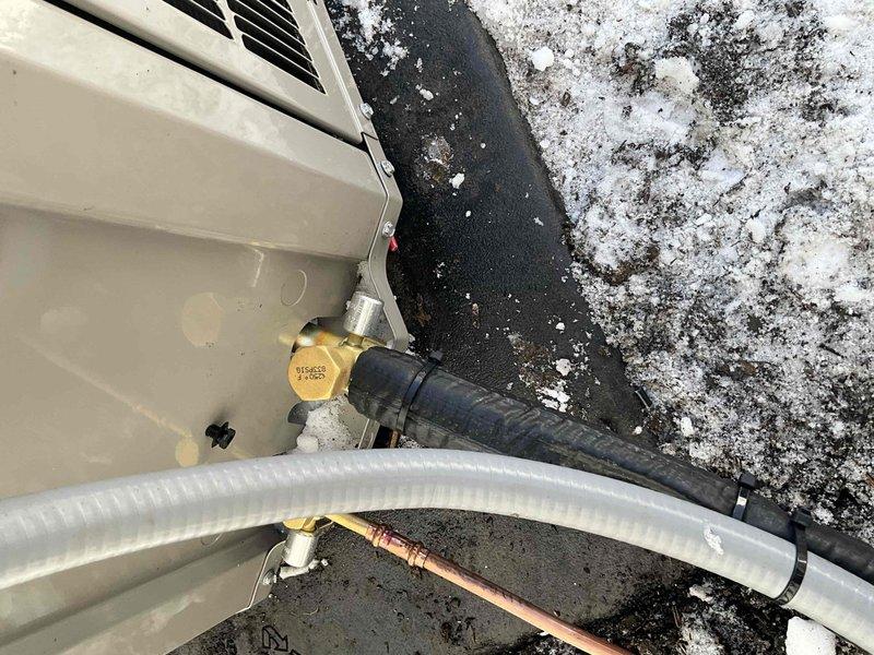 Completed full system replacement including installation of new Bryant outdoor condensing unit, furnace, evaporator coil, and thermostat. Replaced existing refrigerant line set and added 1210 refrigerant to the system. All components were properly installed and tested during winter conditions. System is operational with proper refrigerant charge and connections.