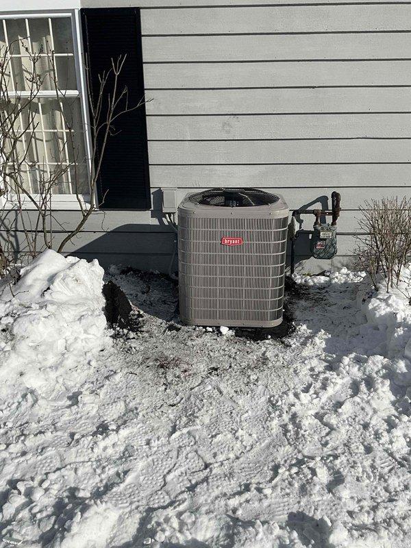 Completed full system replacement including installation of new Bryant outdoor condensing unit, furnace, evaporator coil, and thermostat. Replaced existing refrigerant line set and added 1210 refrigerant to the system. All components were properly installed and tested during winter conditions. System is operational with proper refrigerant charge and connections.