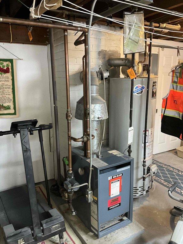 Conducted boiler replacement estimate for a Weil McLain system, sizing at 133,000 BTU. Inspected existing mechanical room configuration with current boiler unit and associated piping network. Documented ceiling clearances and ductwork to ensure proper installation parameters for the new system.