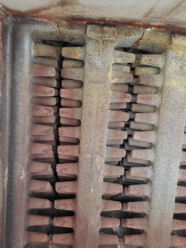 Performed scheduled Home Plan Heating Tune Up on system. Inspected gas valve assembly and verified proper flame pattern with consistent blue flames across all burner tubes. Examined heat exchanger fins and found normal oxidation with no significant blockages or structural concerns.