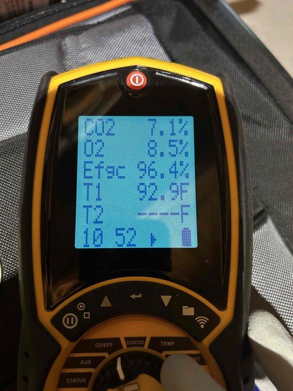 Performed scheduled heating tune-up on furnace and humidifier as part of customer's home plan renewal. Conducted combustion analysis showing furnace operating at 96.4% efficiency with CO levels at 7ppm, CO2 at 7.0-7.1%, and excess air at 71.0%. System temperatures measured at 92.9°F with acceptable oxygen levels at 8.5%.