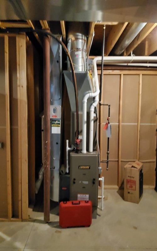 Performed second opinion inspection on Lennox furnace system with suspected heat exchanger failure. Confirmed diagnosis of compromised heat exchanger, requiring replacement. Documented existing installation configuration and exterior venting for reference in replacement proposal.