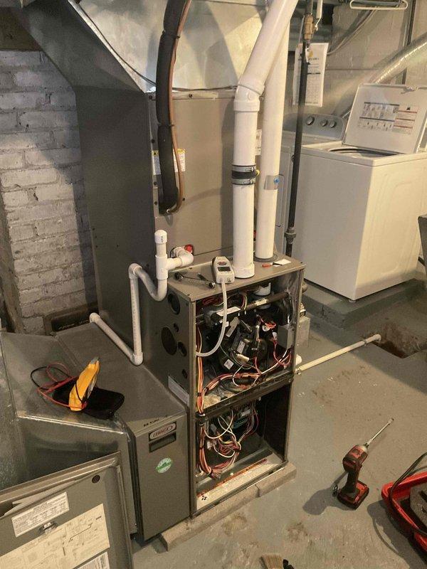 Performed scheduled furnace maintenance service. Accessed internal components for inspection, verified electrical connections, and checked control board functionality. System is operating within normal parameters.
