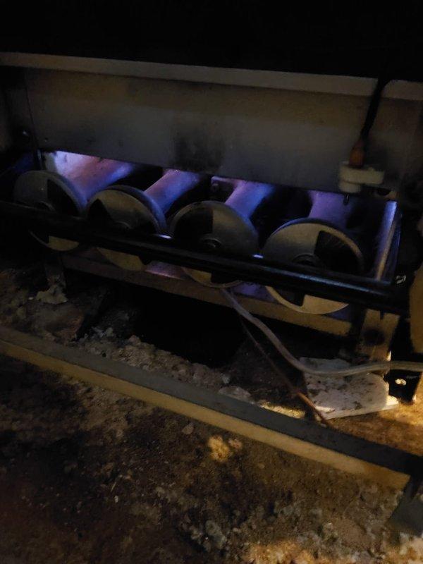 Responded to emergency call for boiler leaking hot water onto floor. Upon inspection, determined source of leak and completed necessary repairs. Tested burner operation and verified proper combustion with consistent blue flames across all four burner tubes, confirming system is now functioning safely with no further leakage.