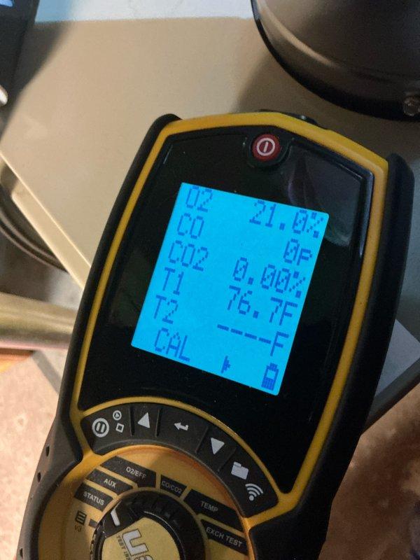 Performed scheduled maintenance on 23-year-old steam boiler. Conducted combustion analysis with readings showing optimal oxygen levels (21.0%), zero carbon monoxide (0 PPM), and normal operating temperature (76.7°F). Inspected heat exchanger components and verified proper condition of internal fins and piping.
