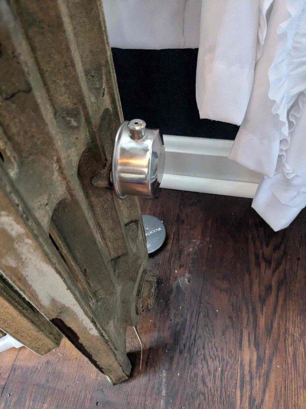 Responded to service call for 1938 steam radiator system requiring repair. Inspected aged plumbing components including main water valve and connecting pipes showing significant wear. Serviced door-adjacent radiator assembly and restored proper functionality to the vintage heating system.